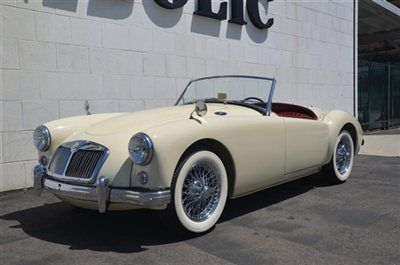1957 mg 57. off white. red interior. 4 speed manual. convertible.