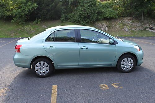 2010 toyota yaris sedan manual transmission - very low 13k miles - will deliver