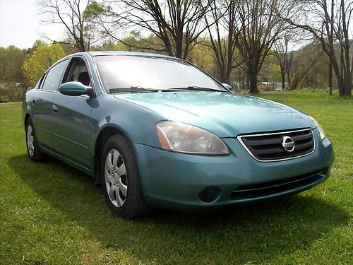 2002 nissan altima 2.5l sedan - great gas mileage!! drive it home!!