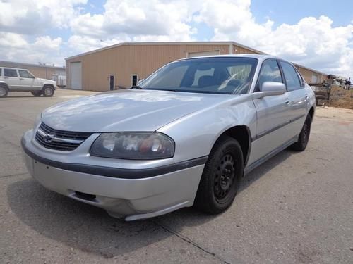 Silver chevy impala powerful and clean. clear title. ice cold a/c