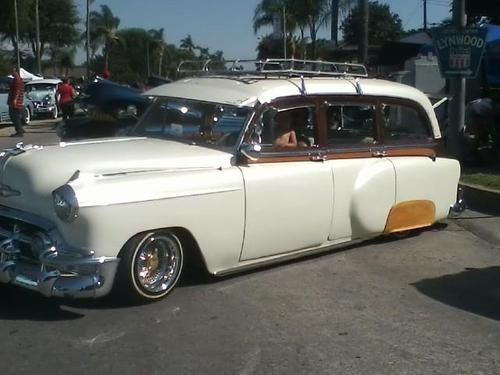 1953 chevy wagon custom inside and out. pearl paint, chrome and gold hydralics