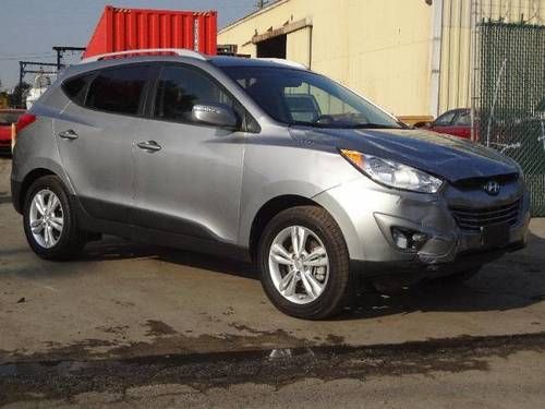 2013 hyundai tucson  awd salvage repairable rebuilder only 1k miles runs!!!