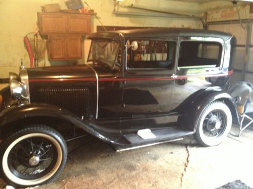 1930 ford model a tudor 2 door/ black/red pinstripe