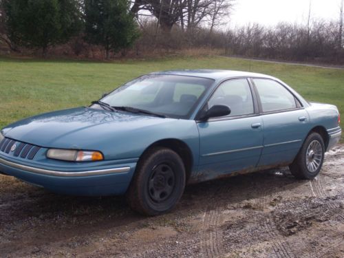 Clean, nonsmoker, runs great, 2 owners, teal color, power locks/windows/seats