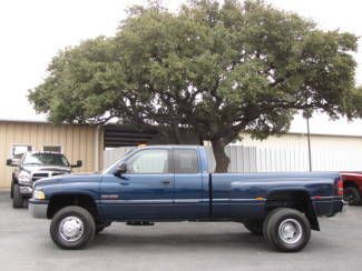 Slt laramie pwr opts cruise a/c cd 5.9l cummins diesel dually 4x4 50k miles!