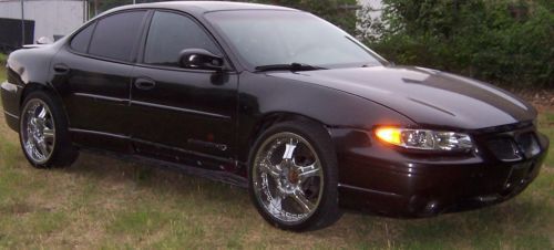 2002 pontiac grand prix with 20 inch rims - rough but cheap