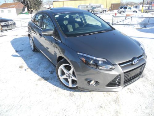 2013 ford focus titanium 2.0l/navi/htd/sunroof/sensor/cam/l.e.d/salvage/rebuilt