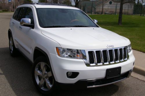 2013 jeep grand cherokee overland 4x4,5.7l hemi, panroof, nav, rebuilt, warranty