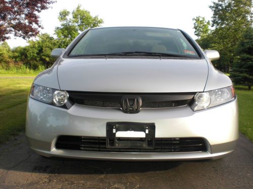 2008 honda civic lx, 4 door sedan, manual 5 speed transmission