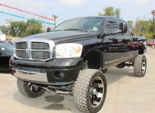 6.7l i6 diesel laramie leather 9in lift 24in rims off road sunroof bluetooth 4x4