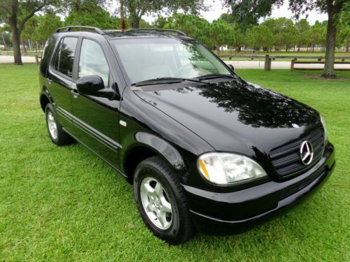 Florida winter pkg ml 320 all wheel drive 71,391 miles navi ready no reserve !!