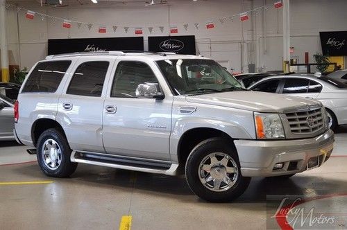 2004 cadillac escalade luxury, custom three rear dvd screens, heated seats, navi