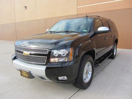 2007 chevrolet suburban~z71~4wd~3rd seat~roof~tv/dvd~htd lea~1 owner