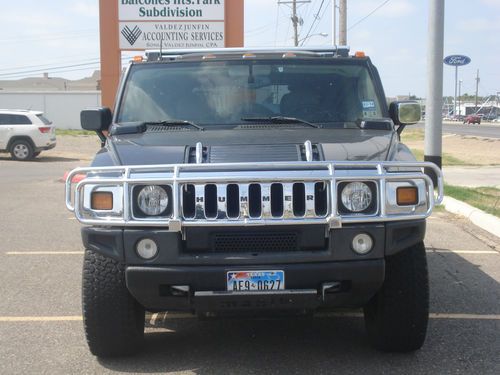 2003 h2 hummer. black and chrome. power everything. excellent condition. grey le