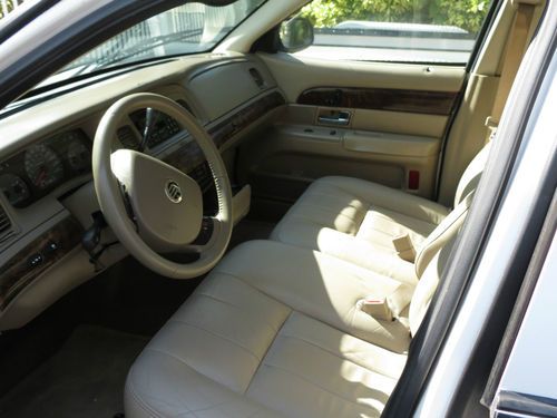 White ,tan interior,49k miles,one owner