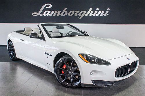 Sport cabrio! + low miles!! + black whls + nav + bose surrond + carbon fiber