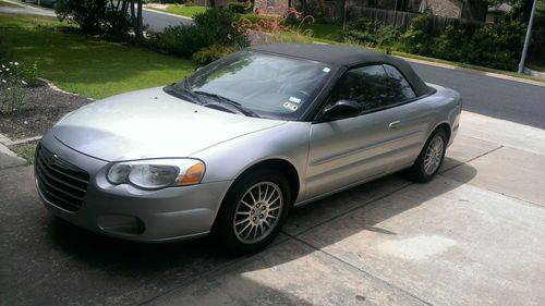 Silver, 2-door convertible car