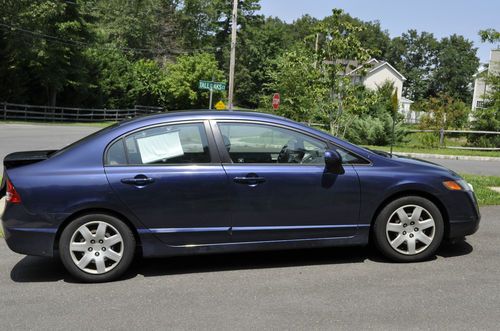 2006 honda civic lx sedan 4-door 1.8l dark blue, low mileage, well maintained