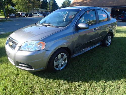 2011 chevy aveo, sedan, salvage, runs and drives, left side damage