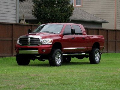 Mega cab 4x4 ( laramie ) lifted! 1 owner..nice