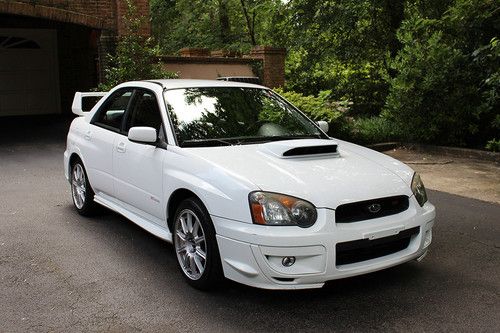 2005 subaru wrx sti, 2nd owner, stock never modified, 61k miles no accidents