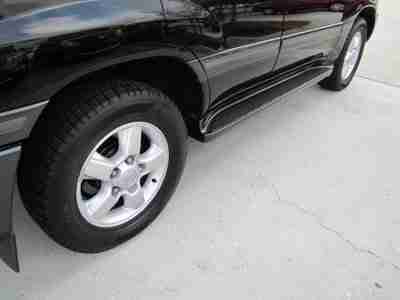 4dr 4X4 (GS) SUV 4.7L Sunroof Third Row Seat CD CURTAIN & SIDE AIRBAGS Tow Hooks, image 8