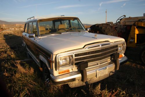 1988 jeep grand wagoneer, 4-door, white and wood grain with a 360 v-8.