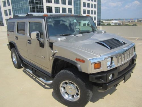 2005 hummer h2 3rd seat- dvd- leather- sunroof- bose