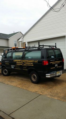 2002 dodge van, 8 foot bed, two tool cabinets, ladder rack