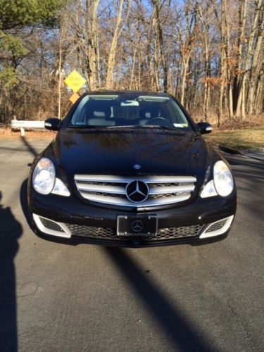 Clean, black on black, full glass sunroof, wireless dvd system