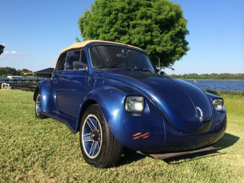Blue 1973 super beetle convertible with rebuilt 1600cc engine and tan canvas top