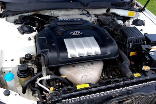 NO RESERVE, Good Mileage 2006 Kia Optima LX 4 dr sedan, 2.4 L 4 cylinder,Sony CD, image 19