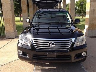 2009lexus lx 570 black/tan loaded.20&#034; chrome,luxury pkg clean carfax,one owner