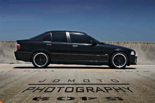 Blacked out sedan