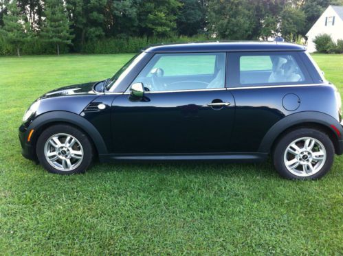 Blue cooper, sunroof, body and interior flawless, averages 38.4 mpg