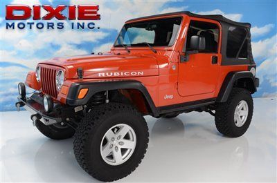 Rubicon 6 spd manual, locking diff., rough country lift, warn bumpers low miles