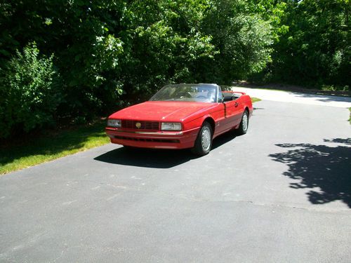 1991 cadillac allante convertible bright red,black leather,black top,58k miles