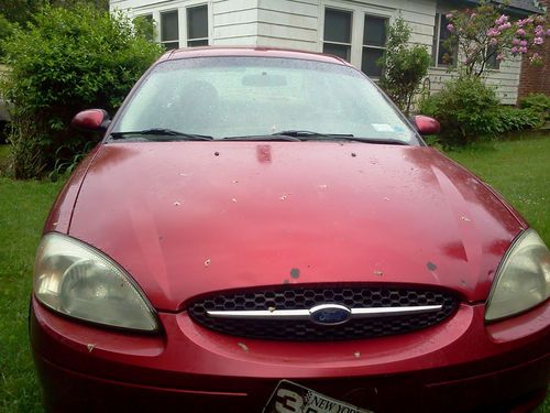 Red ford taurus runs good, good condition