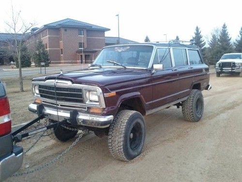 1988 jeep wagoneer , lifted , 33 in tires , 360 eng