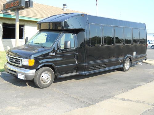 E 450 24 passenger van plus driver black