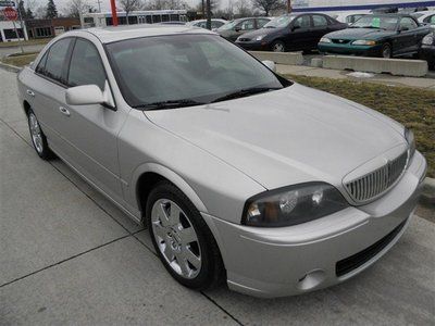 Silver sedan one owner sunroof chrome wheel leather clean title finance air auto