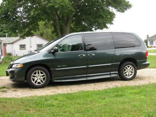 Handicapped van 2000 dodge caravan sport with hand controls and side ramp n more