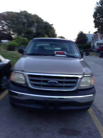 2001 ford f-150, no accidents, clear title, utility box, 8 feet bed, no reserve