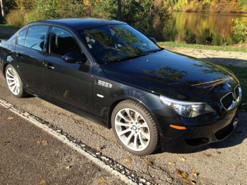 2010 bmw m5 e60 black sapphire met ext./black vent/heated leather int. with wood