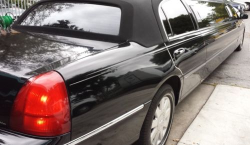 2004 black 120&#039;&#039; krystal limousine with canvas top &amp; sunroof