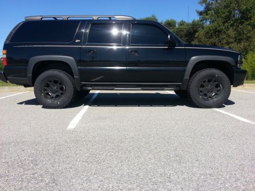 Blacked out and lifted 2004 chevrolet suburban z71