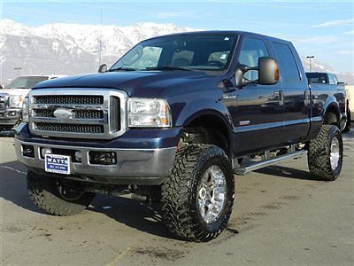 Ford crew cab lariat 4x4 powerstroke diesel custom lift wheels tires leather