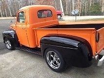 New chevrolet 350 engine with less than 1000 miles on it, black &amp; orange color