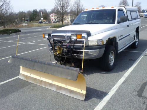 2001 dodge ram 2500 4 x 4 regular cab with a 7.5 foot meyer snow plow 5.9 gas