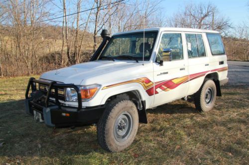 2012 land cruiser hzj76 5 speed, diesel wagon